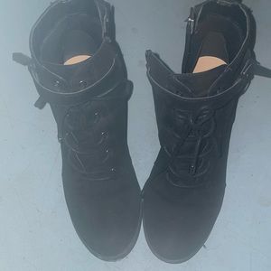 Zip up booties with short heels.